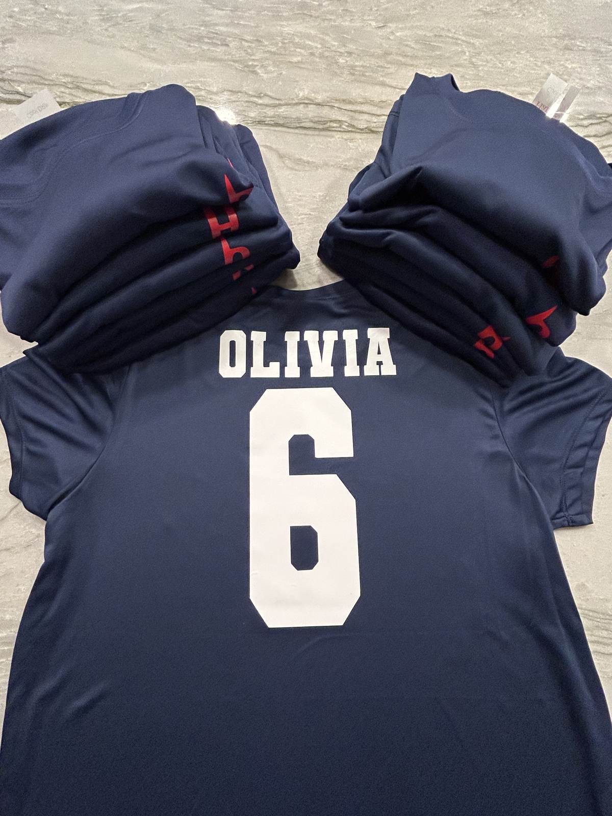 Navy custom jersey personalized with a name and number