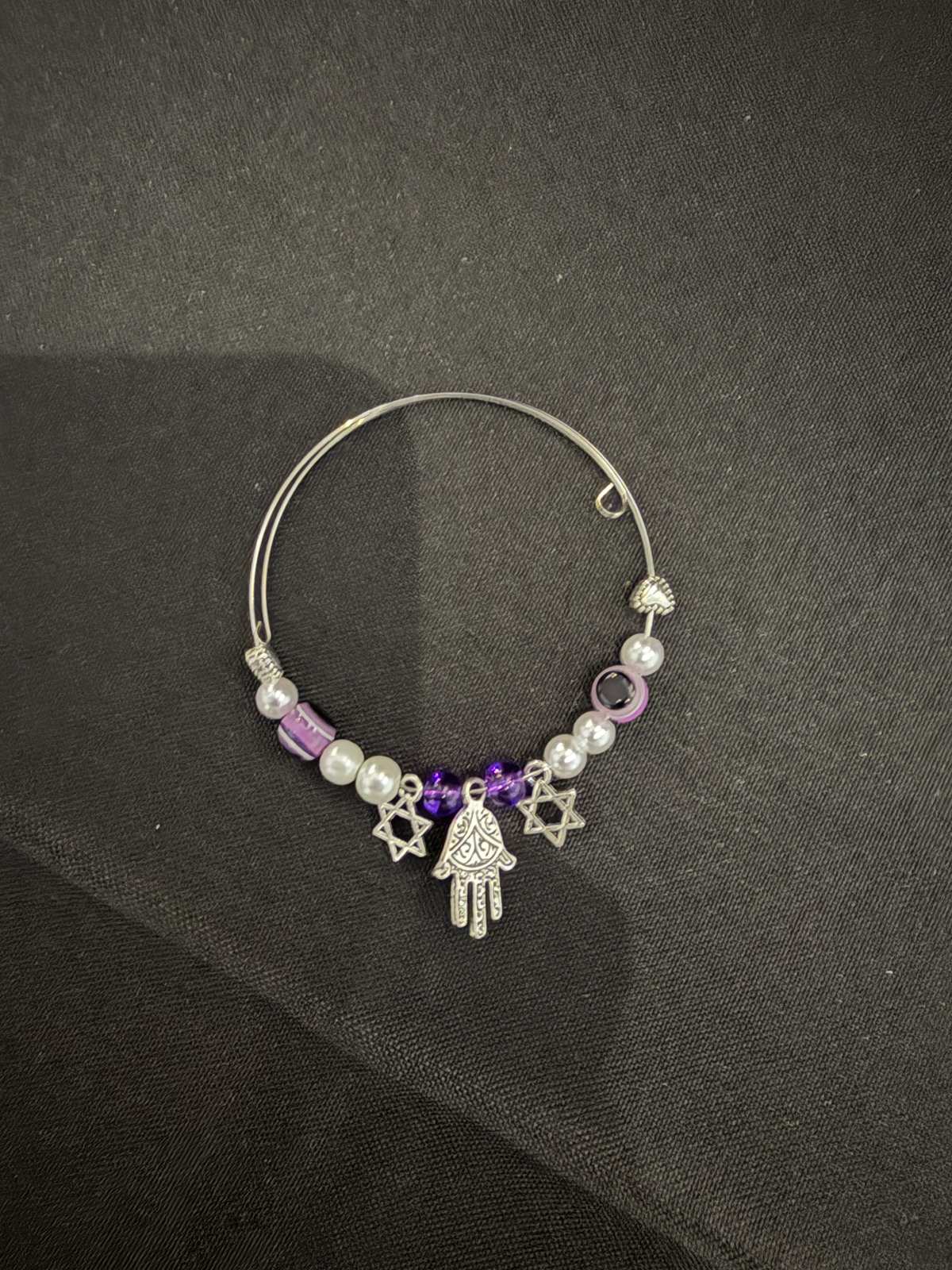 Beaded charm bracelet with hamsa and Star of David charms