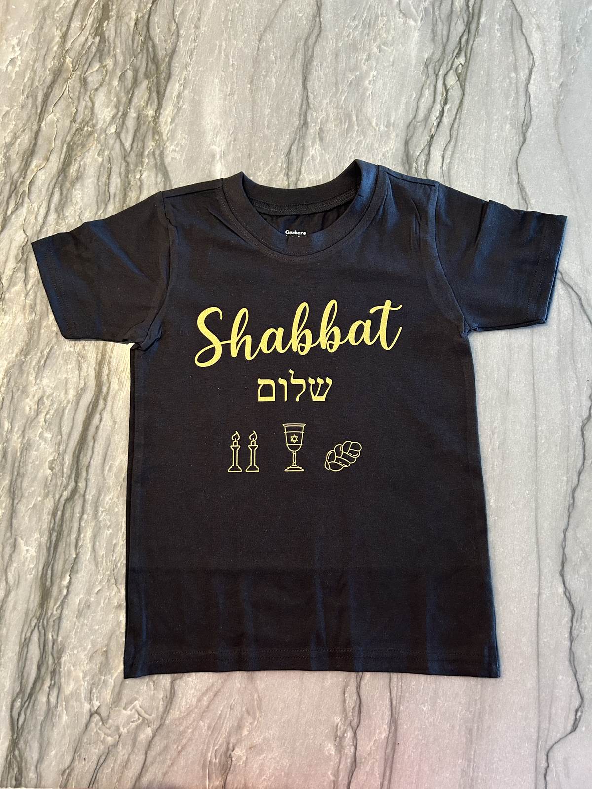 Navy custom t-shirt printed with Shabbat Shalom in English and Hebrew