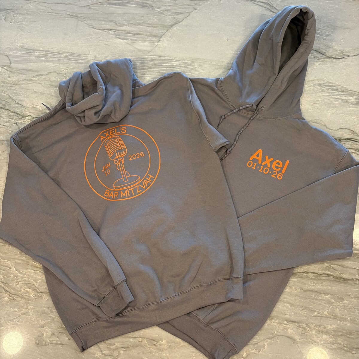 Grey custom bar mitzvah hoodies with a personalized logo and date