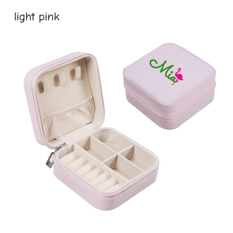 Personalized light pink travel jewelry box printed with a name and flamingo